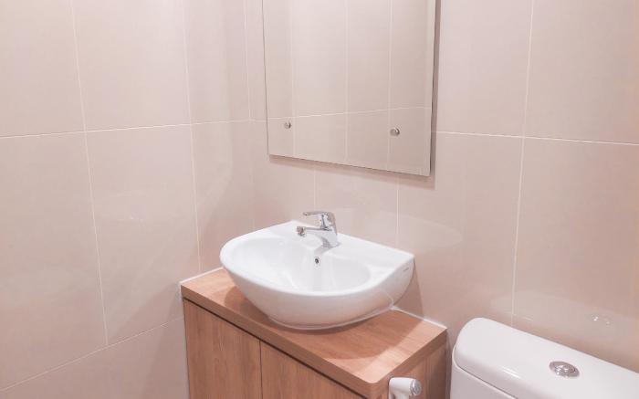 Nice and Modern 2BR M-Town Signature By Travelio