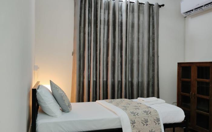 Getaway Family Homestay 2min walk to Arossim Beach