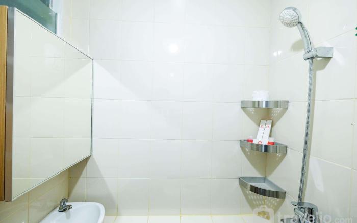 Classic 2BR Bassura City Apartment By Travelio