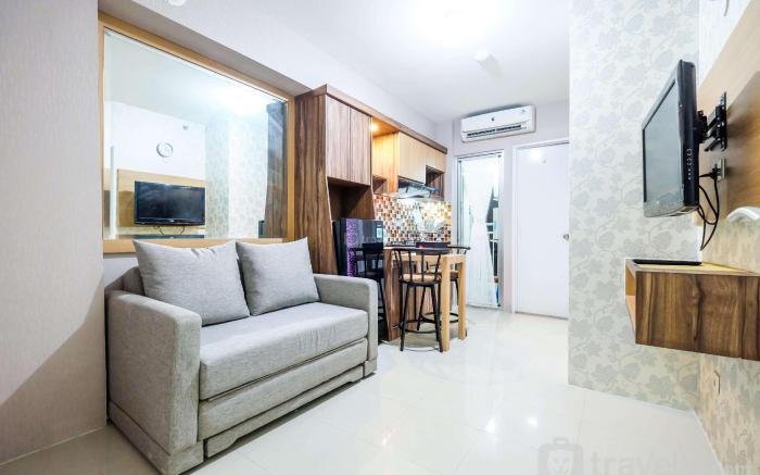 Classic 2BR Bassura City Apartment By Travelio