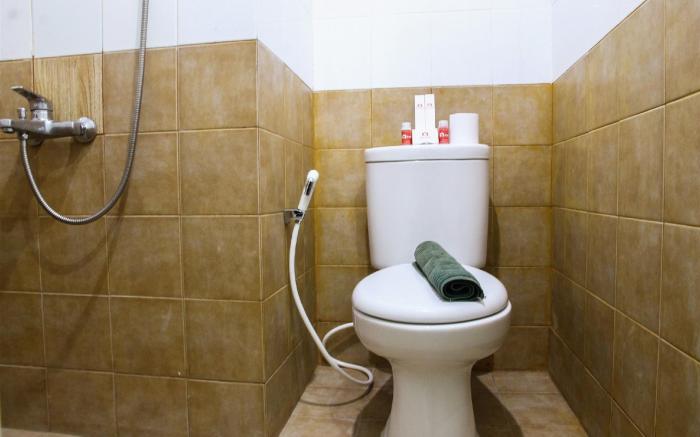 Well Designed 2BR Green Pramuka Apt By Travelio