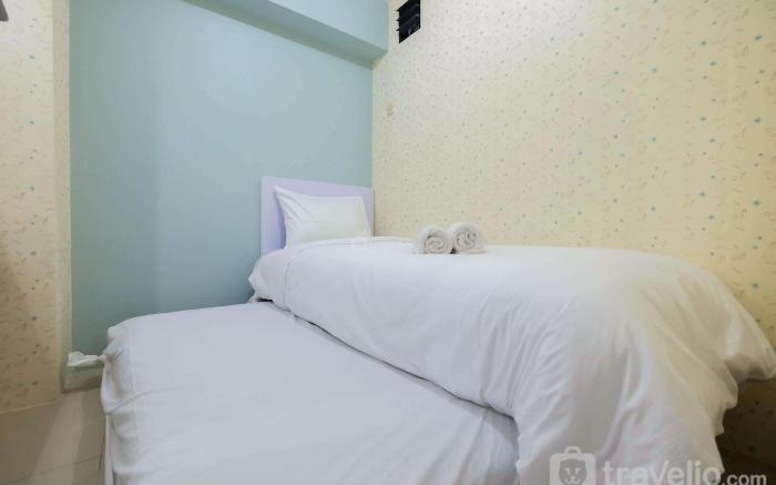 Comfy 2BR Bassura City Apt near Mall By Travelio