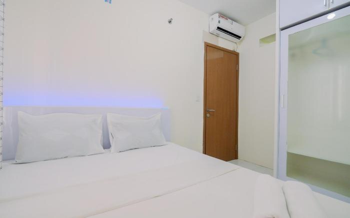 Homey 2BR Apartment Podomoro Golf View By Travelio