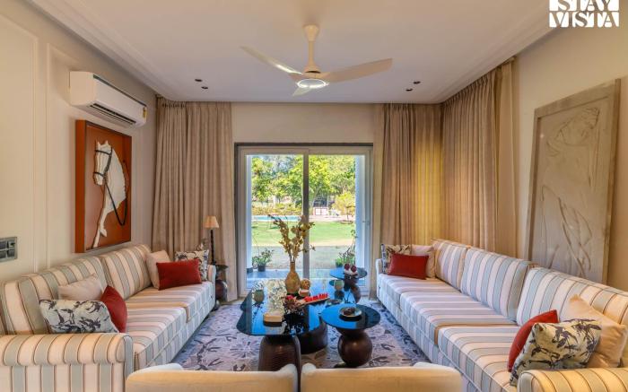 StayVista at Barton Estate w/ Outdoor Pool-Manesar
