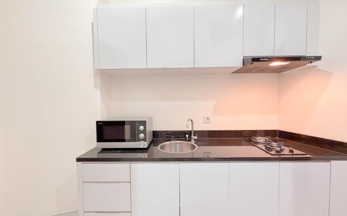 Homey 3BR at Grand Sungkono Lagoon Apt By Travelio