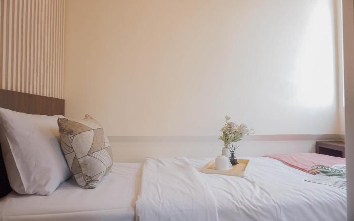 Warm and Modern Style 2BR Meikarta Apt By Travelio