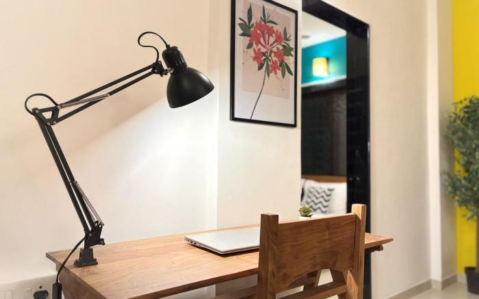 Stylish 1BHK Near Airport by CozyCave | PLG201
