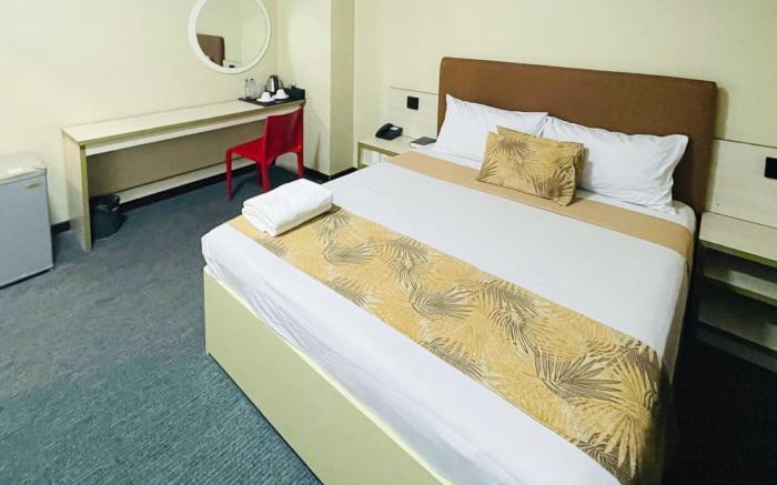 Marianne Suites Hotel by RedDoorz