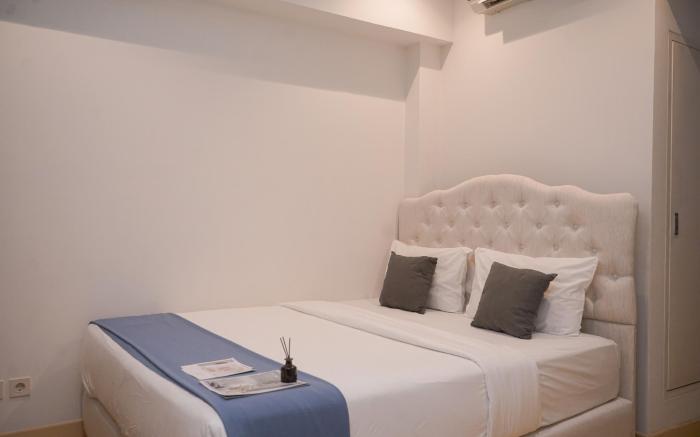 Comfy Minimalist 1BR Branz BSD City By Travelio