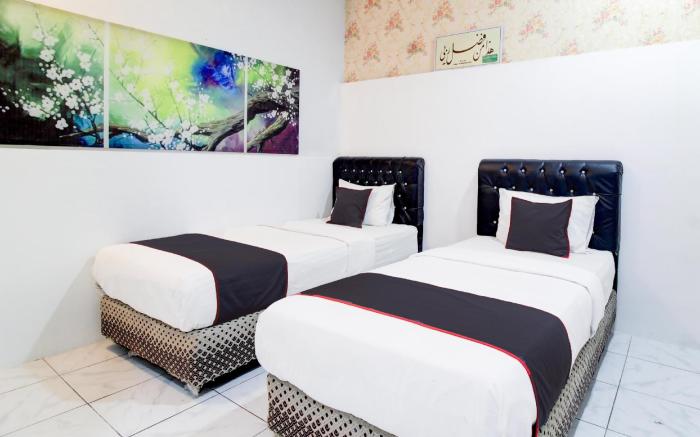 Hotel O Jalan Jenderal Sudirman Near Imam Bonjol Square Formerly Nelvi Guest House