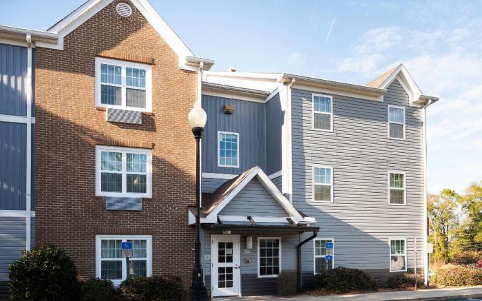 Alluxsuites at 1876, an Ascend Collection Hotel