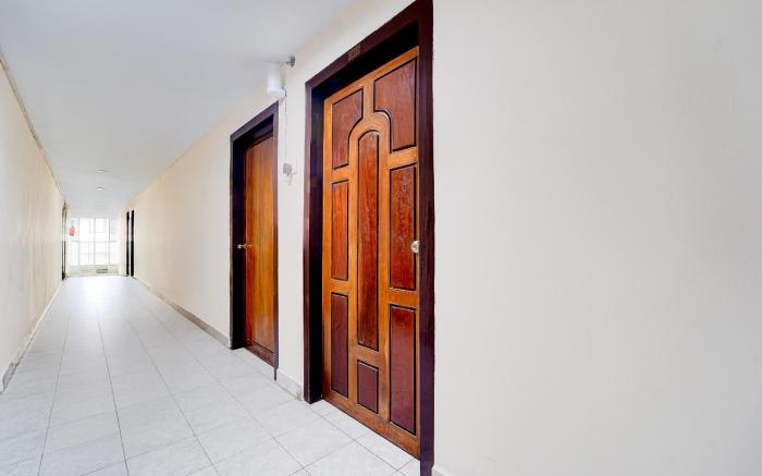 Super Hotel O Pathanamthitta Near Mahatma Gandhi Statue