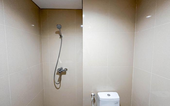 Elegant 1BR Grand Sungkono Lagoon Apt By Travelio