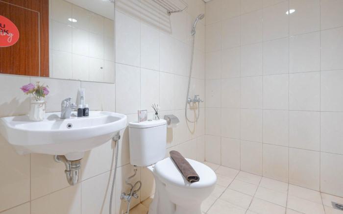 Spacious 2BR Apt at Vittoria Residence By Travelio