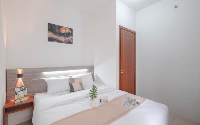 Minimalist 2BR Apt Vittoria Residence By Travelio
