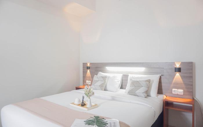 Stunning 2BR Apt at Vittoria Residence By Travelio