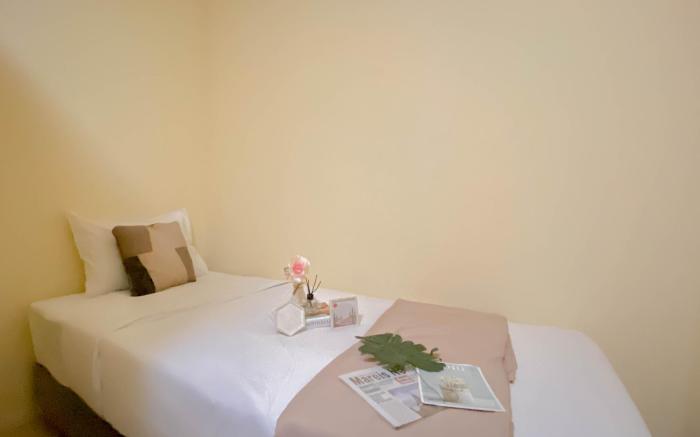 Comfy 2BR Apt Woodland Park Residence By Travelio