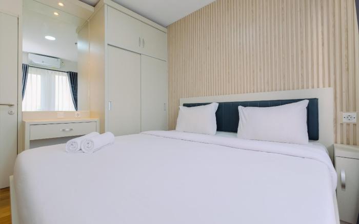 Restful Modern 2BR at Sentul Tower Apt By Travelio