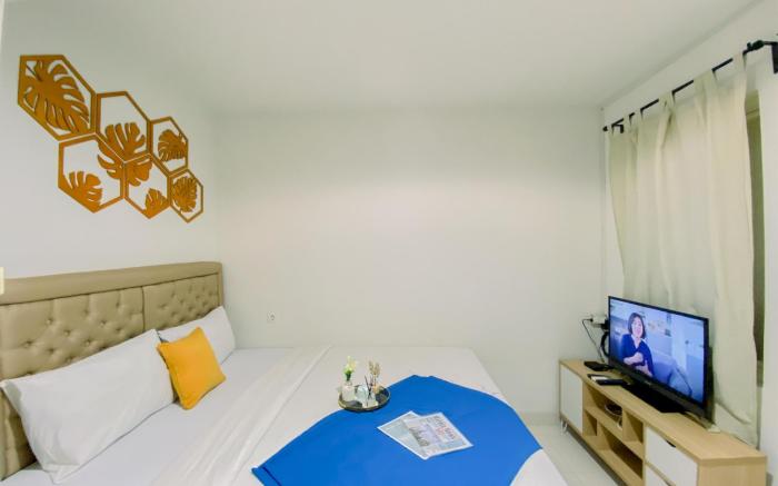 Modern Look 1BR at Sentul Tower Apt By Travelio