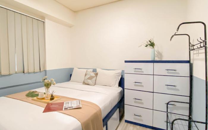 Spacious Cozy 2BR at Apt Meikarta By Travelio