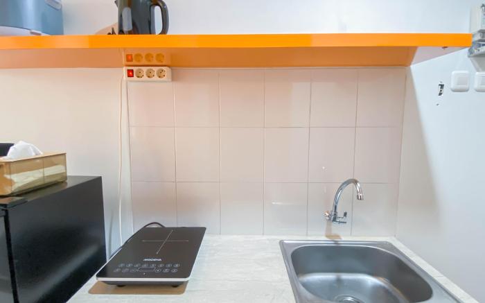 Minimalist Studio Room Apt at Evenciio By Travelio