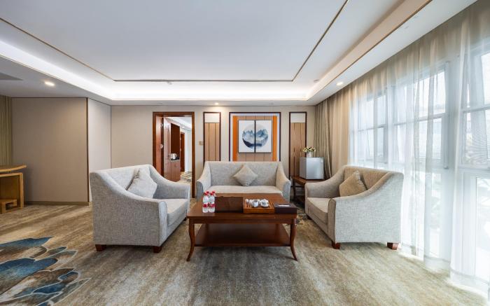 Xinrun Hua Hotel - Guangming City Station Hongqiao Park  Branch