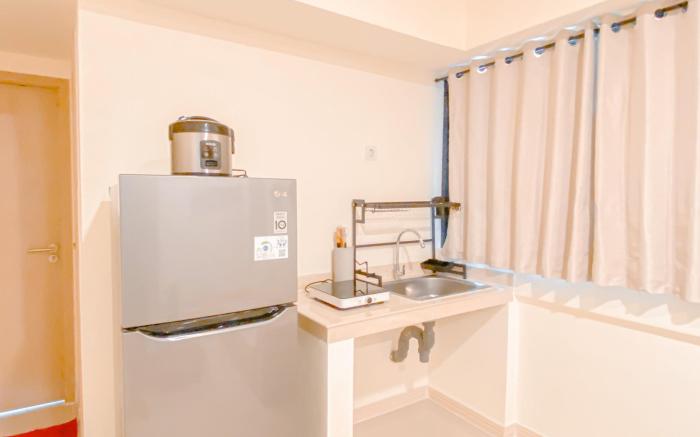 Warm and Cozy 2BR Meikarta Apartment By Travelio