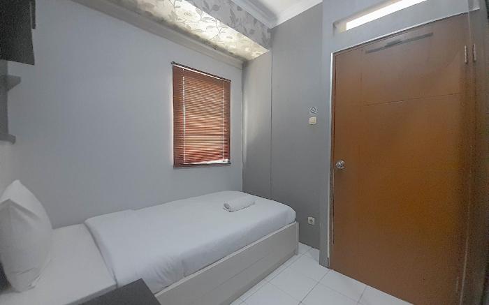 Cozy 3BR Gateway Ahmad Yani Cicadas By Travelio
