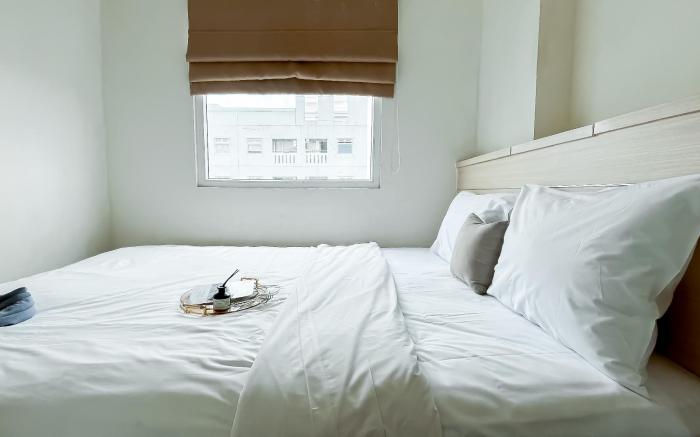 Restful Homey 2BR Green Pramuka City By Travelio