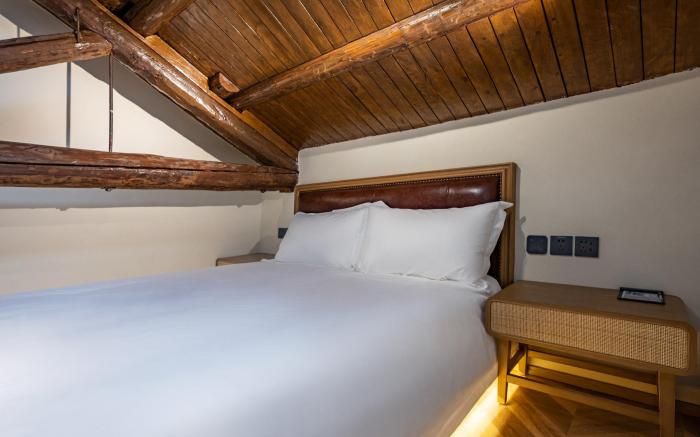 Qiuguo Hutong Courtyard Hotel)