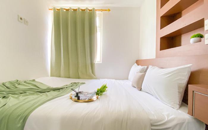 Elegant 2BR at Green Pramuka City Apt By Travelio