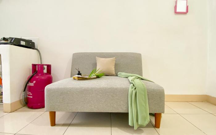 Homey Modern 2BR Green Bay Pluit Apt By Travelio
