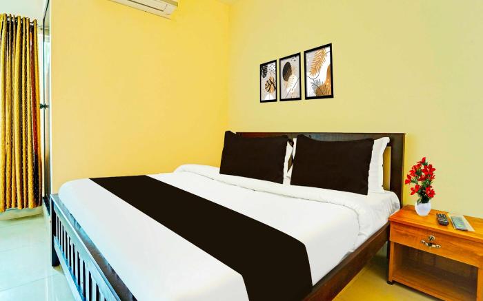 Hotel O Kureepuzha Kollam