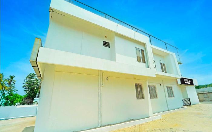 Hotel O Kureepuzha Kollam