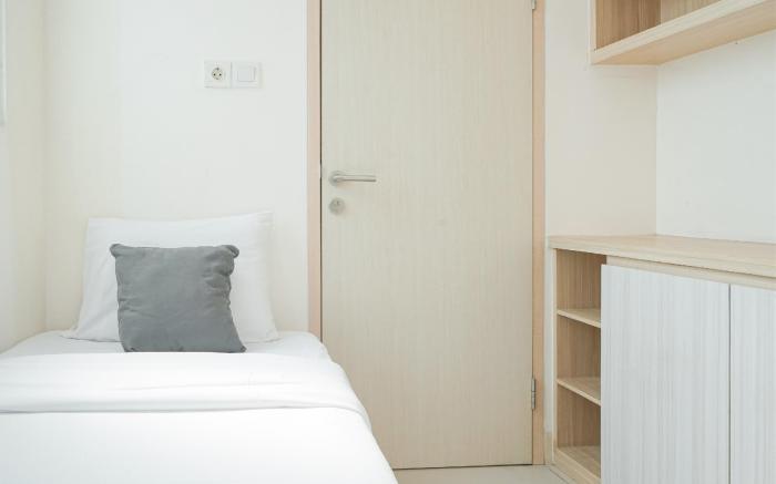 Modern Look 2BR Apt Tree Park City BSD By Travelio