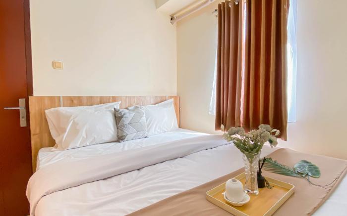 Cozy 2BR at Bogor Valley Apartment By Travelio