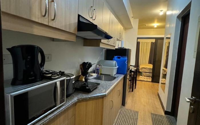 Cozy 1BR fronting pool near NAIA w/ WiFi Netflix