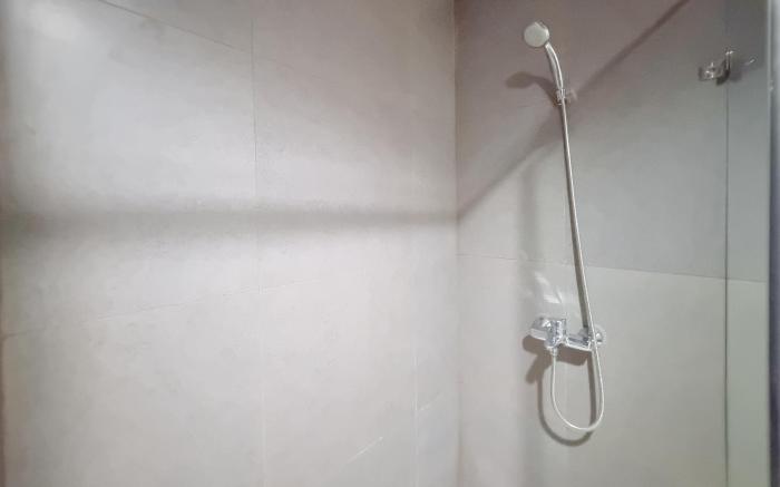 Simply Look 1BR Apt Patraland Amarta By Travelio