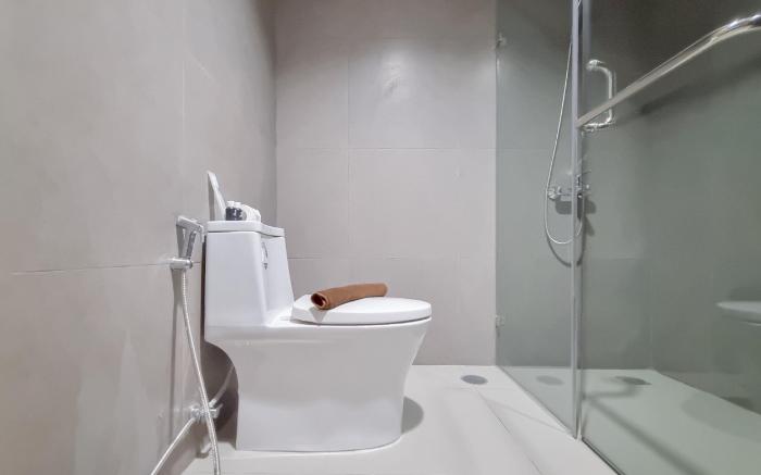 Minimalist 1BR Patraland Amarta Apt By Travelio