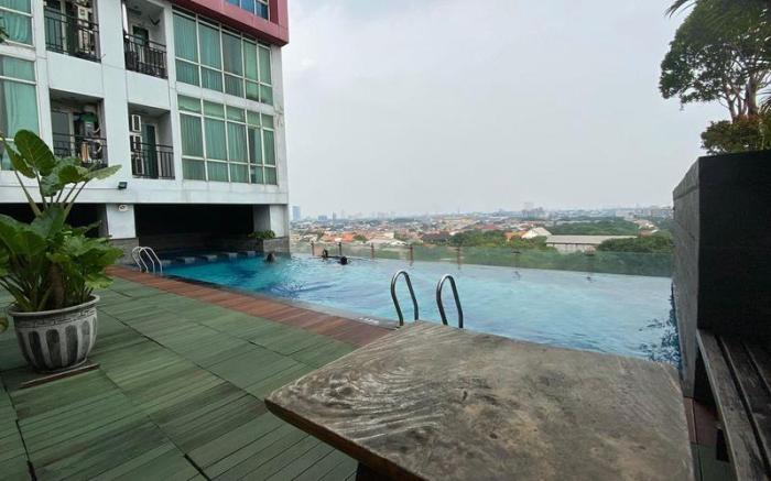 Modern Studio at Tamansari Papilio Apt By Travelio