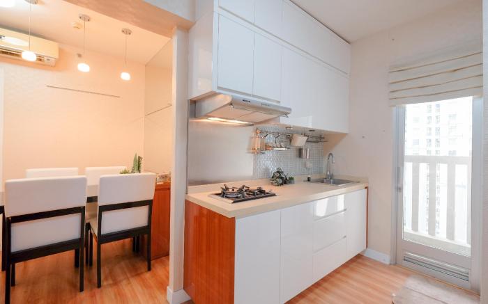 Combined 1BR at Green Bay Pluit Apt By Travelio