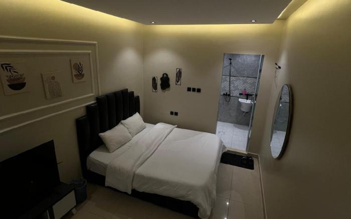 Self check-in studio with a comfortable bed