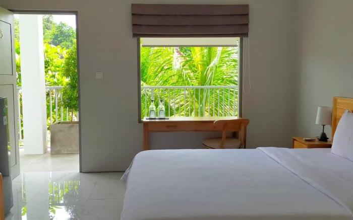 Clean room with comfortable bed