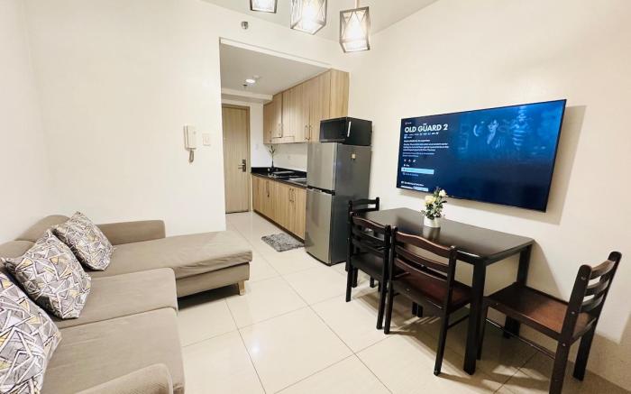 Seaside Tranquility: Cozy Suite in MOA w/ Netflix