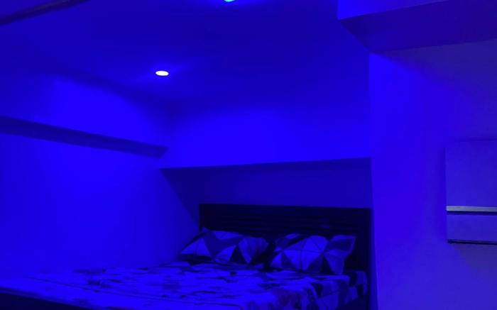 Golden Loft with Mood Lighting,Stylish Staycation Loft  Fast Wi-Fi, Soft Couch