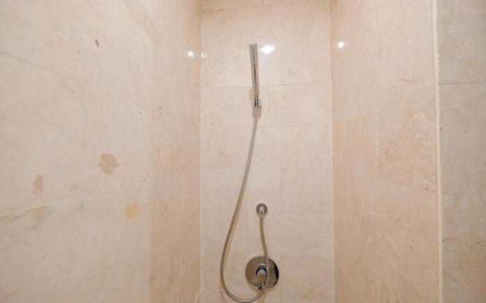 Apt 2BR at Masterpiece The Epicentrum By Travelio