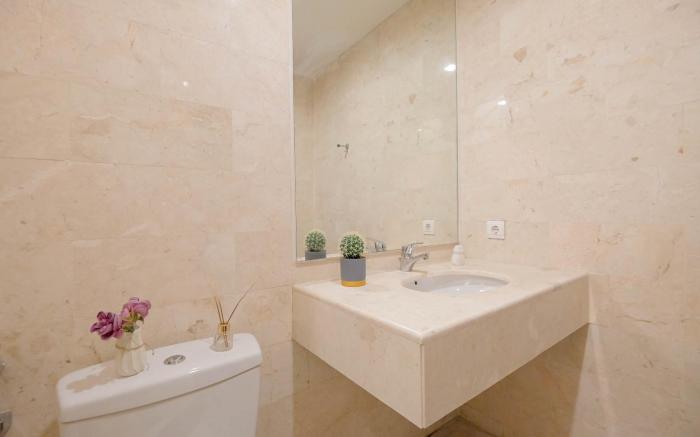 Apt 2BR at Masterpiece The Epicentrum By Travelio