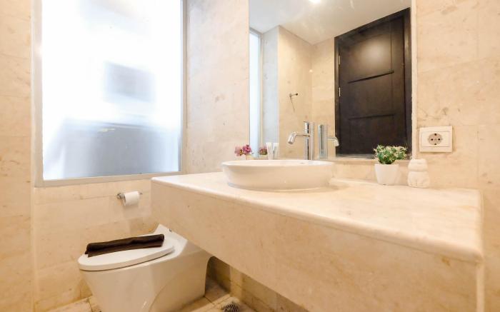 Apt 2BR at Masterpiece The Epicentrum By Travelio