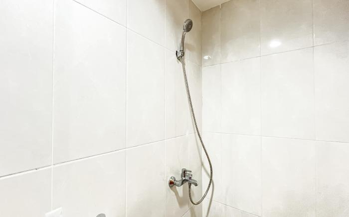 Wooden Nest 2BR Evenciio Margonda Apt By Travelio