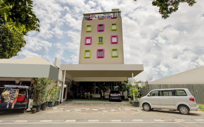 Capital O 94792 Aleander Hotel